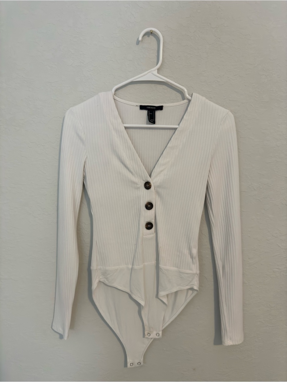 White Ribbed V-Neck Button-Front Bodysuit